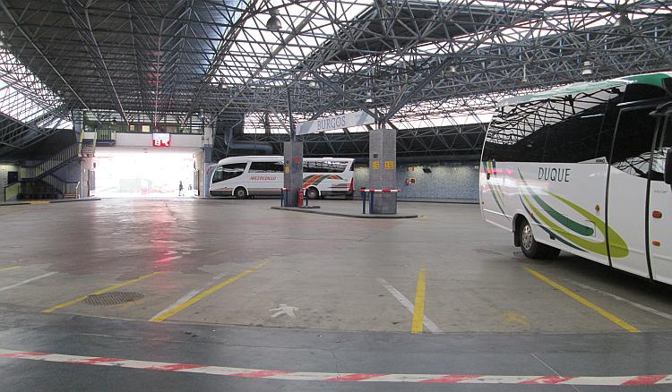 The metal trellis roof and broad swathe of tarmac in the bus station at Burgos