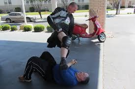 Rick and Stephen fooling around, Stephen has a kilt on