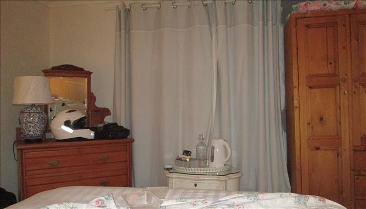 The room at the guest house. A regular bedroom