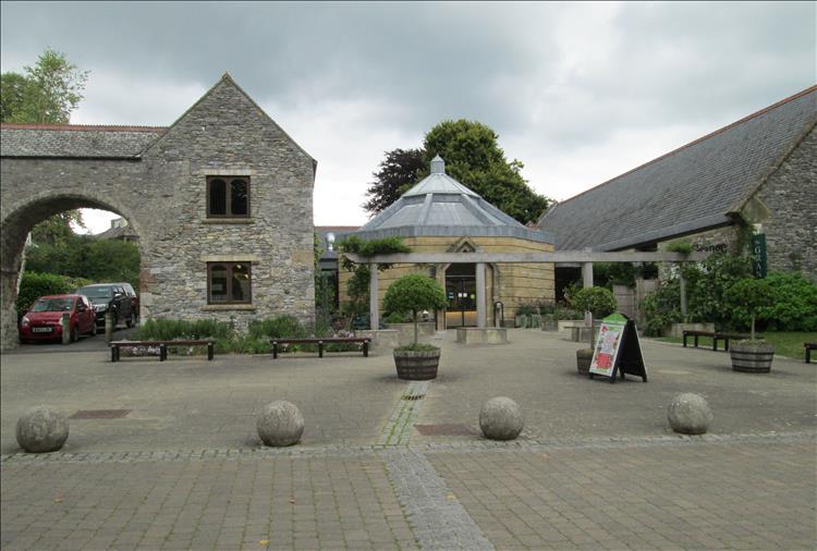 An old gatehouse and a new point reception mix well in the grounds of the abbey