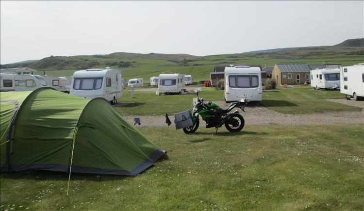 The tent, Sharon's bike and a bungee with clothes drying on it at the campsite