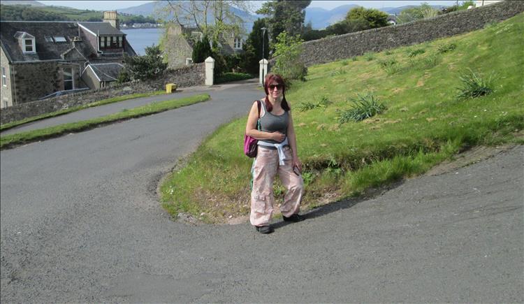 Sharon stands on one of the sharp switchbacks to show us just how steep it really is