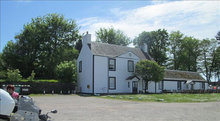 The Oystercatcher at Otter Ferry, a white building that is firmly closed for business today