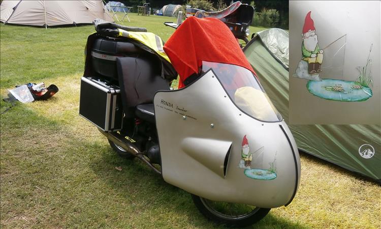 The streamliner has a huge bulbous aluminium fairing now with a gnone fishing sticker