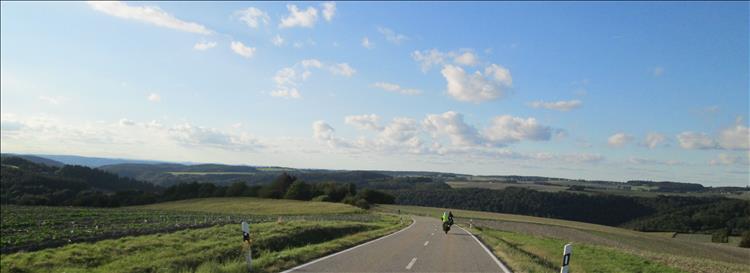 Huge blue skies with gentle hills in Western Germany