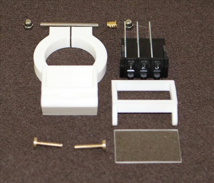 The printed out housing, the bcd switch and several screws, nuts and bolts