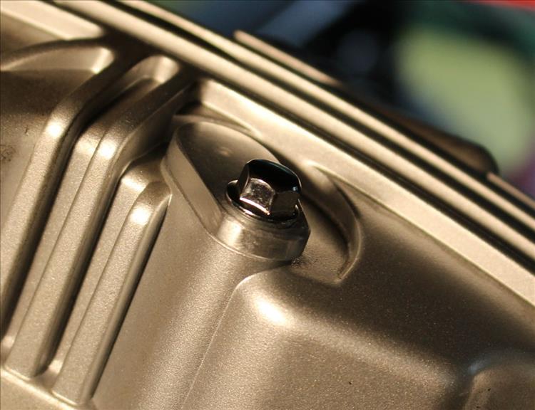 Another small yet well engineered and finished plate bolted to blank off where the air intake used to be