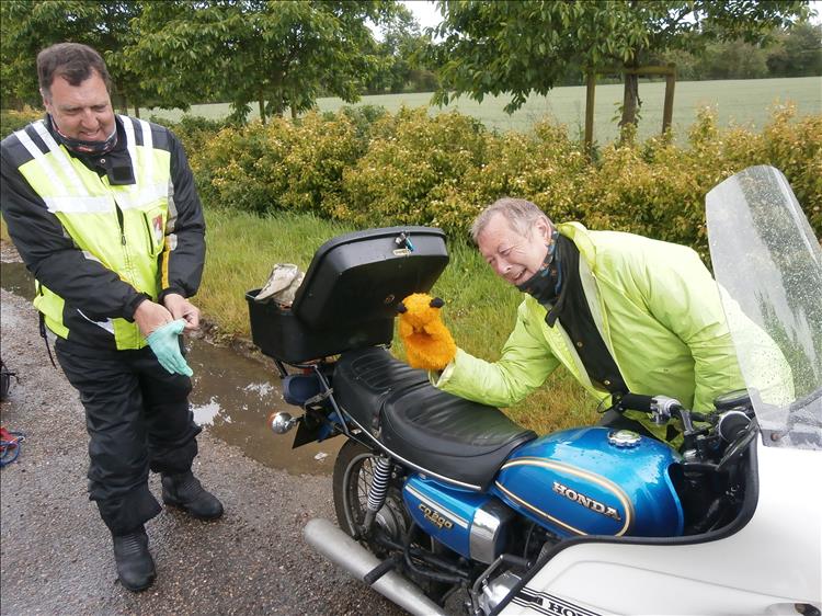 Honda CD200 Benly, bogger putting on gloves and puppet sooty playing around