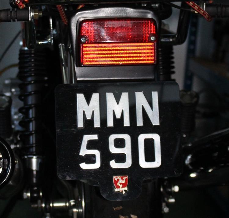 The classic silver letters on a black background style numberplate as created by Mark