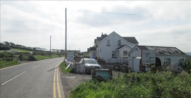 A large white house on the side of the country lane is actually Finn McCool's hostel