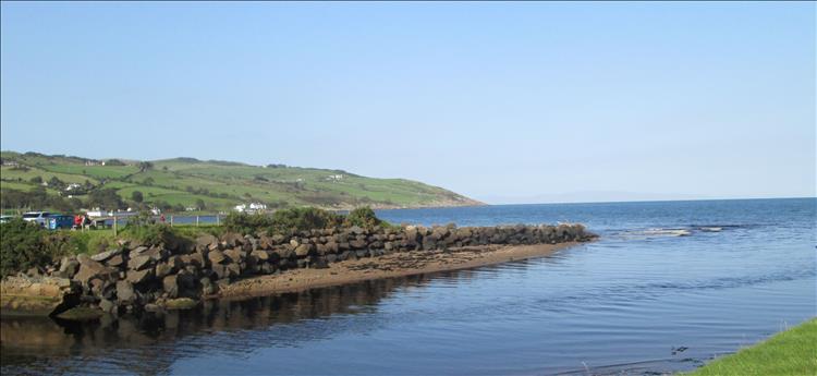 Rolling hills and the sea, in the very far distance we can just, only just see the Mull of Kintyre