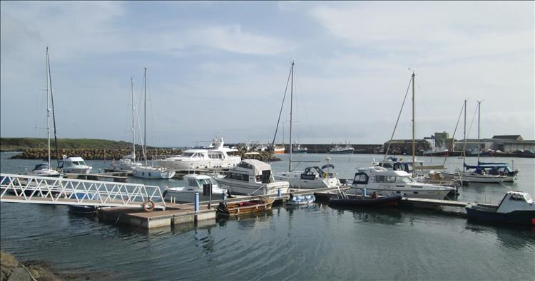 One quite swish yacht and several nice ones and sailing boats at Ardglass