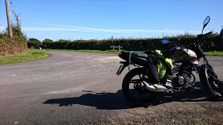 Sharon's 125 in the countryside and sunshine on a short ride out