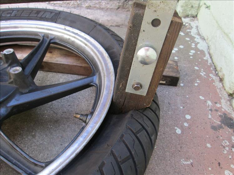 The DIY breaker has pushed the tyre off the rim