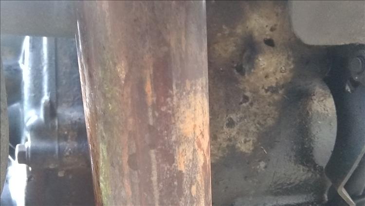 The front of the engine has most of the paint removed from road spray