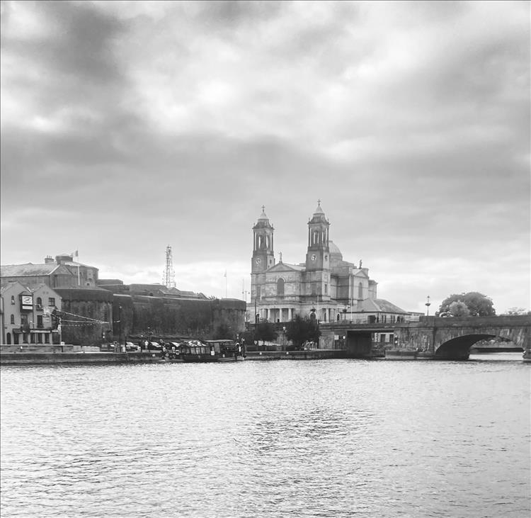 Athlone church by the broad river, the church looks foreign like from Spain