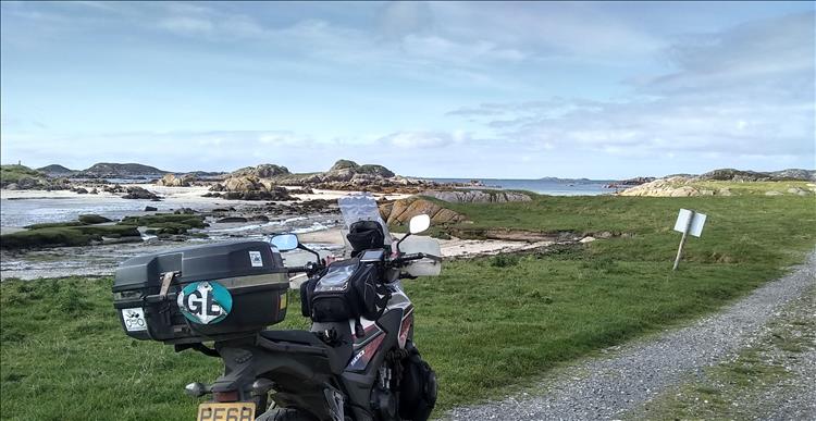 Sand and rocks, grass and outcrops near Fidden Farm Campsite on Mull