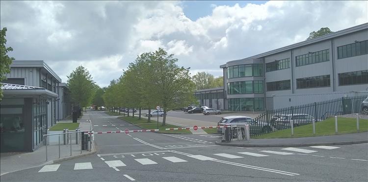 Smart but unremarkable grey modern industrial units form the Merc F1 factory