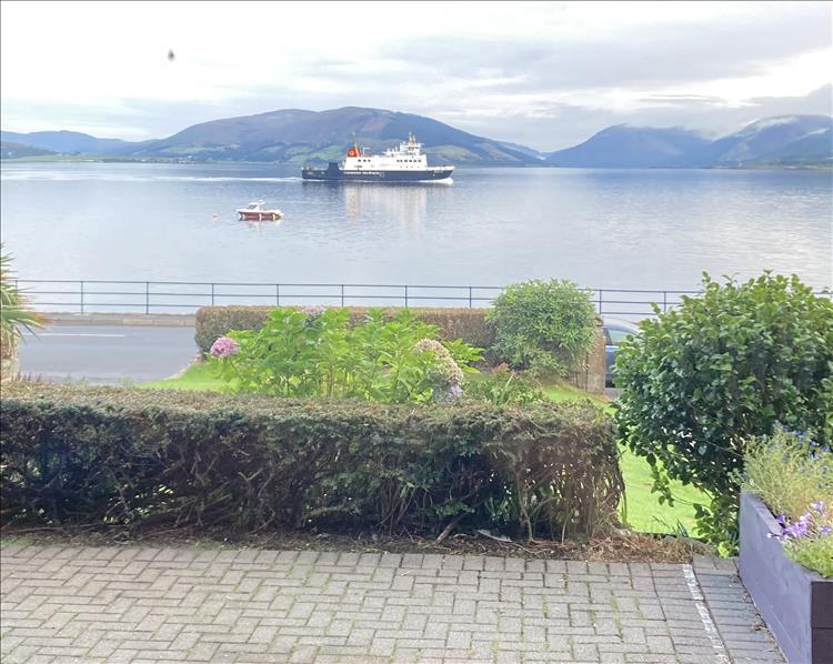 The ferry is on a millpond flat stretch of water between Bute and the mainland