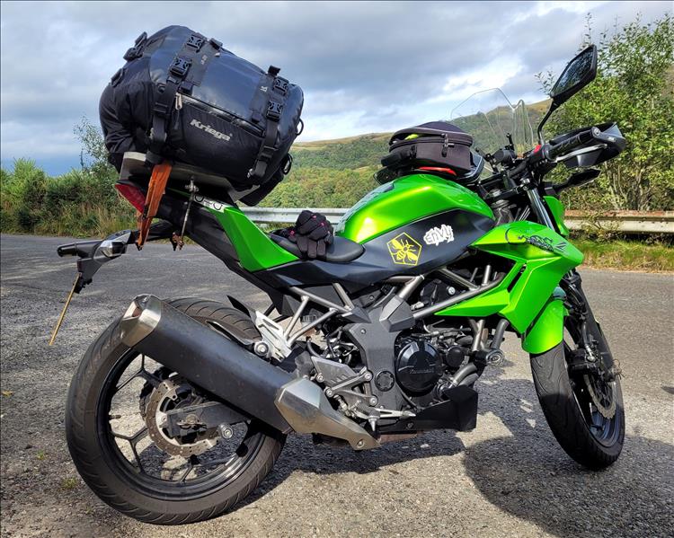 Kawasaki Z250SL loaded with camping luggage for the coming trip