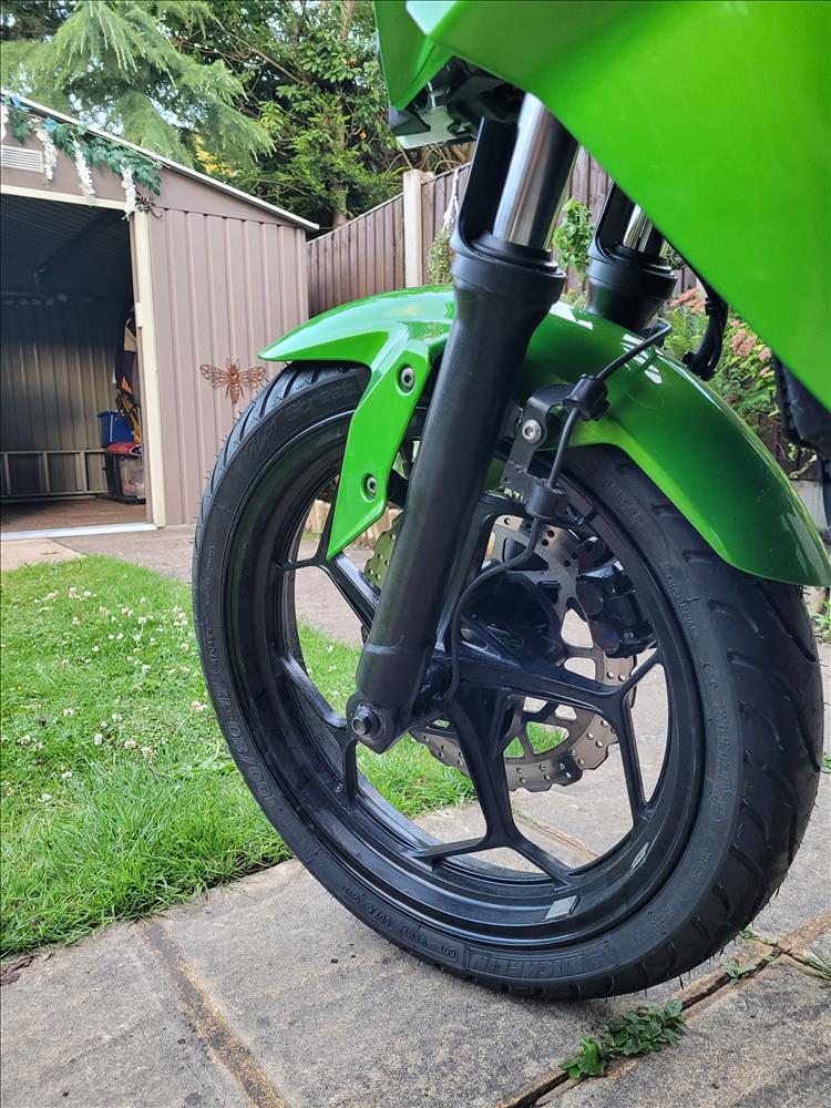 The front of Sharon's Kawasaki with the fork lower in satin black looking quite good