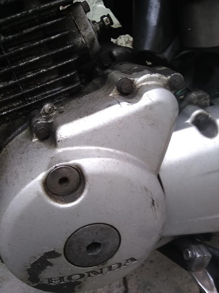 The engine cover over the alternator and starter motor