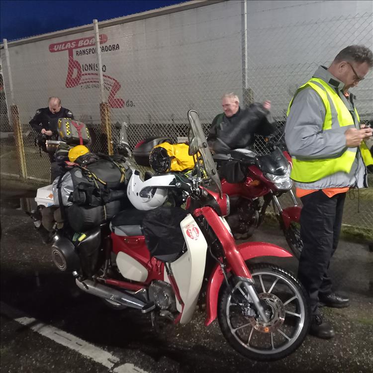 The lads and their small motorcycles are queuing at the ferry in Newhaven