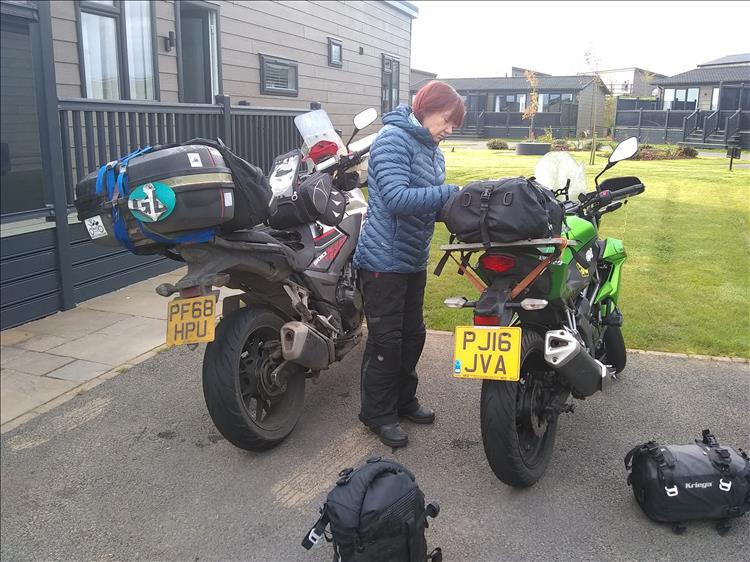 Sharon's loading the Z250SL outside the plastic lodge at Ullswater Heights