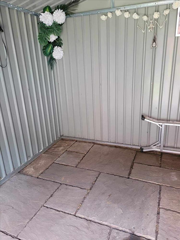 The empty tin shed space where zen was parked