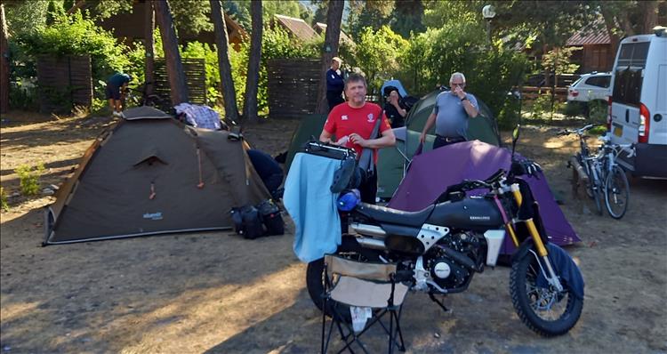 Tents, a couple of the lads, the bikes and sunshine on the campsite