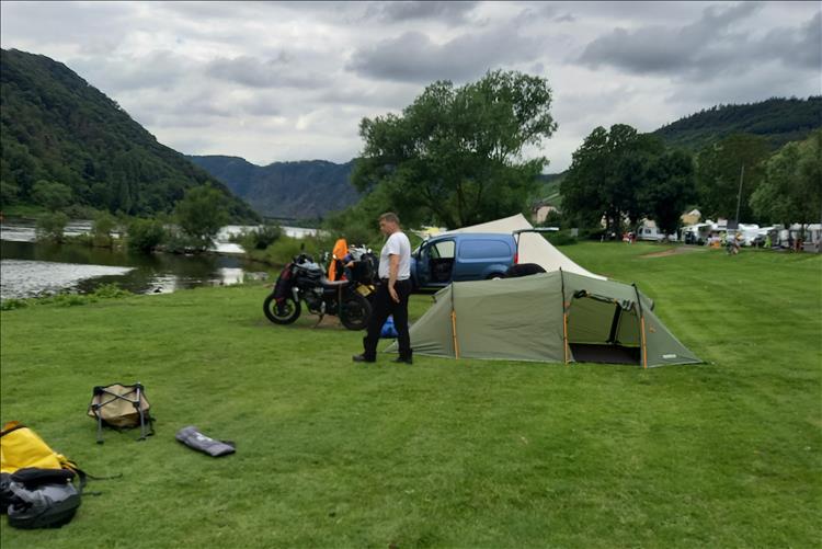 Other campers and riders setting up on the campsite beside the river Moselle