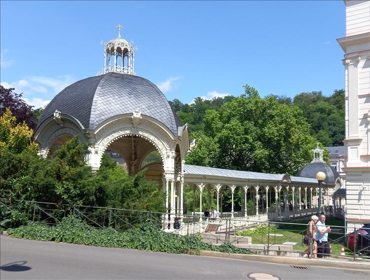 An ornate arched walkway in town