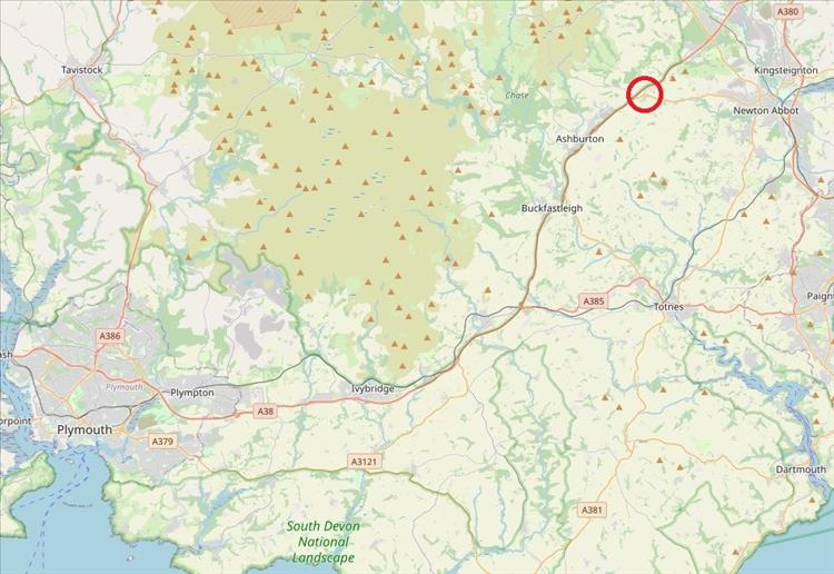 A map with the campsite circled, some 25 miles or more North East of plymouth