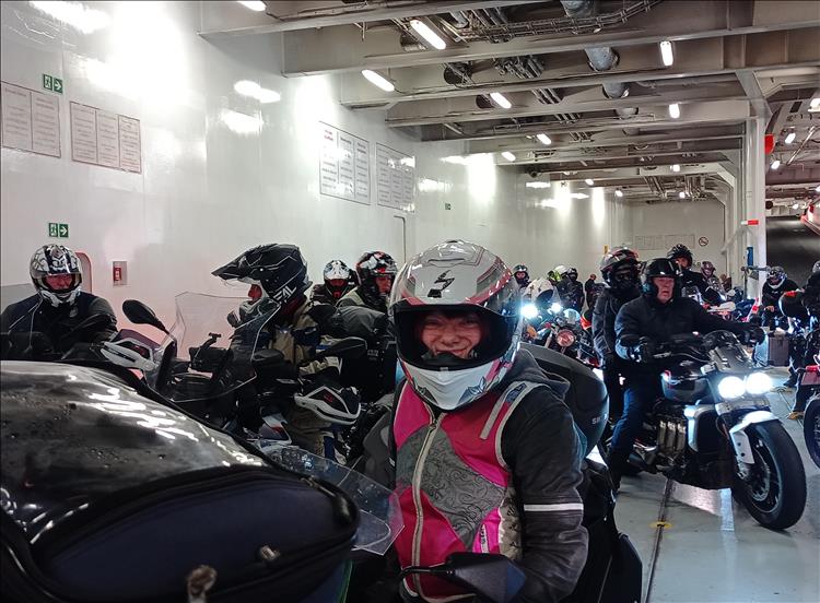 Within the bowels of the ferry Sharon is smiling as she get ready to leave