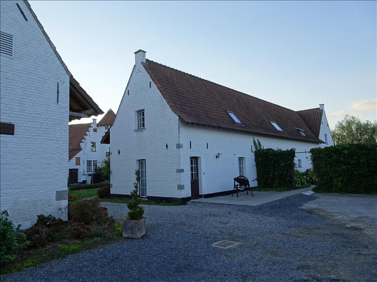 The white painted building of the hotel in Tournai