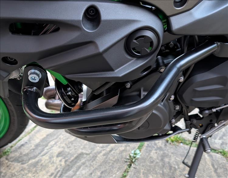 The engine bars wrap around the engine and frame