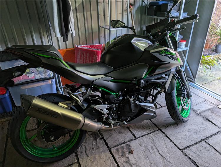 The new bike in the shed seen from the side