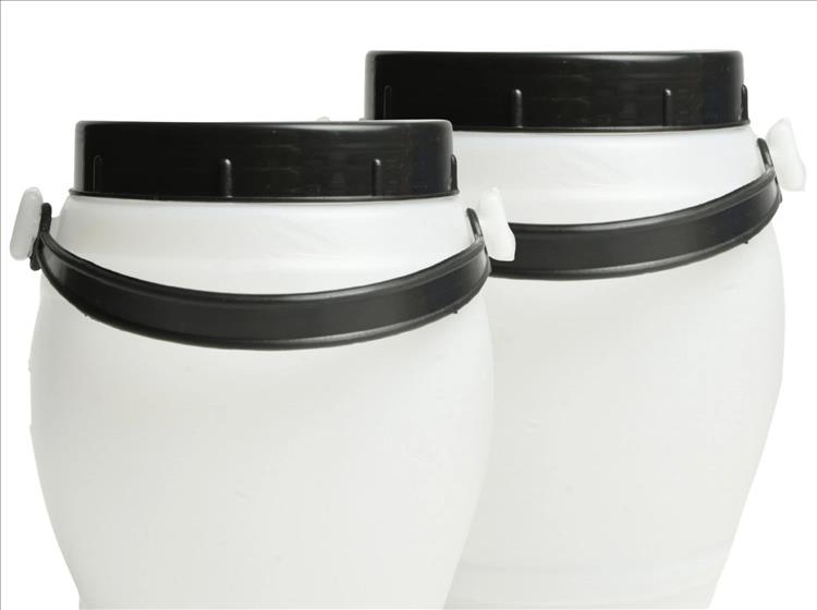 2 white urn shaped plastic tubs with black lids