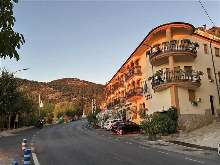 A 3 storey hotel, with balconies and views, Andys bike in on the street and it's all rather swish