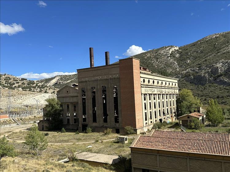 And old stout big powerstation in the middle of nowhere in the huge hills