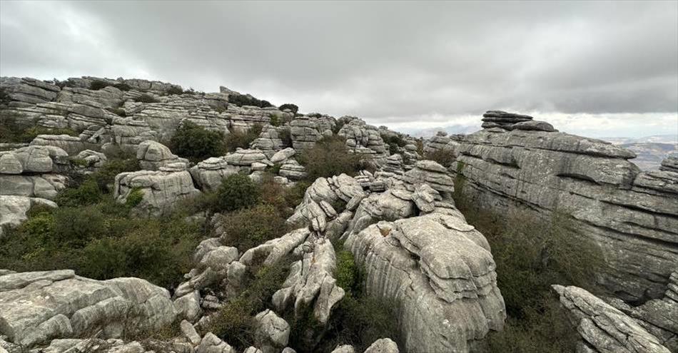 Rock formations with horizontal layers. Massive but could look like stacked stones