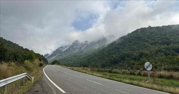 Grey heavy skies over the Pyrenees but the road is dry