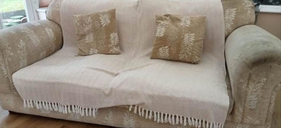 A faded but fine old settee