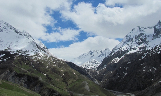 Angular sharp snow covered mountain peaks in the French Alps