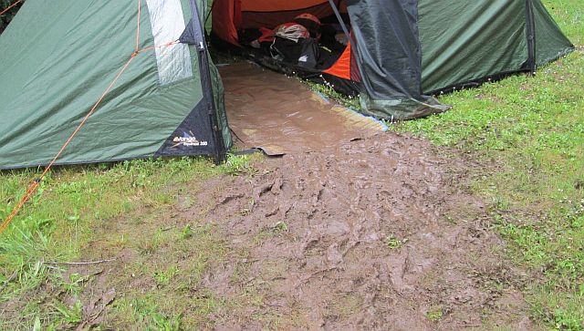 The tent has mud in the porch and thick mud outside