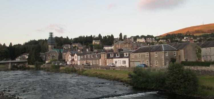 Lanholm town, on the hillside and against a darkening sky