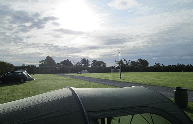 The sun breaks through the clouds at the campsite in Fethard, Ireland