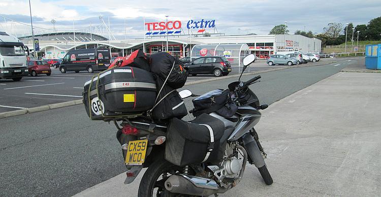 Ren's bike loaded with his camping gear and ready to hit the road at Tesco