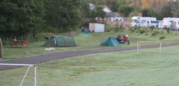 Ren and Mark's motorcycles and tents on a dew heavy morning at Keltie Bridge campsite