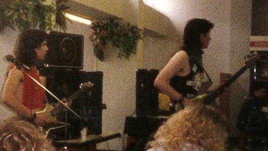 an old picture of Ren and his friend playing a gig in the late 80's